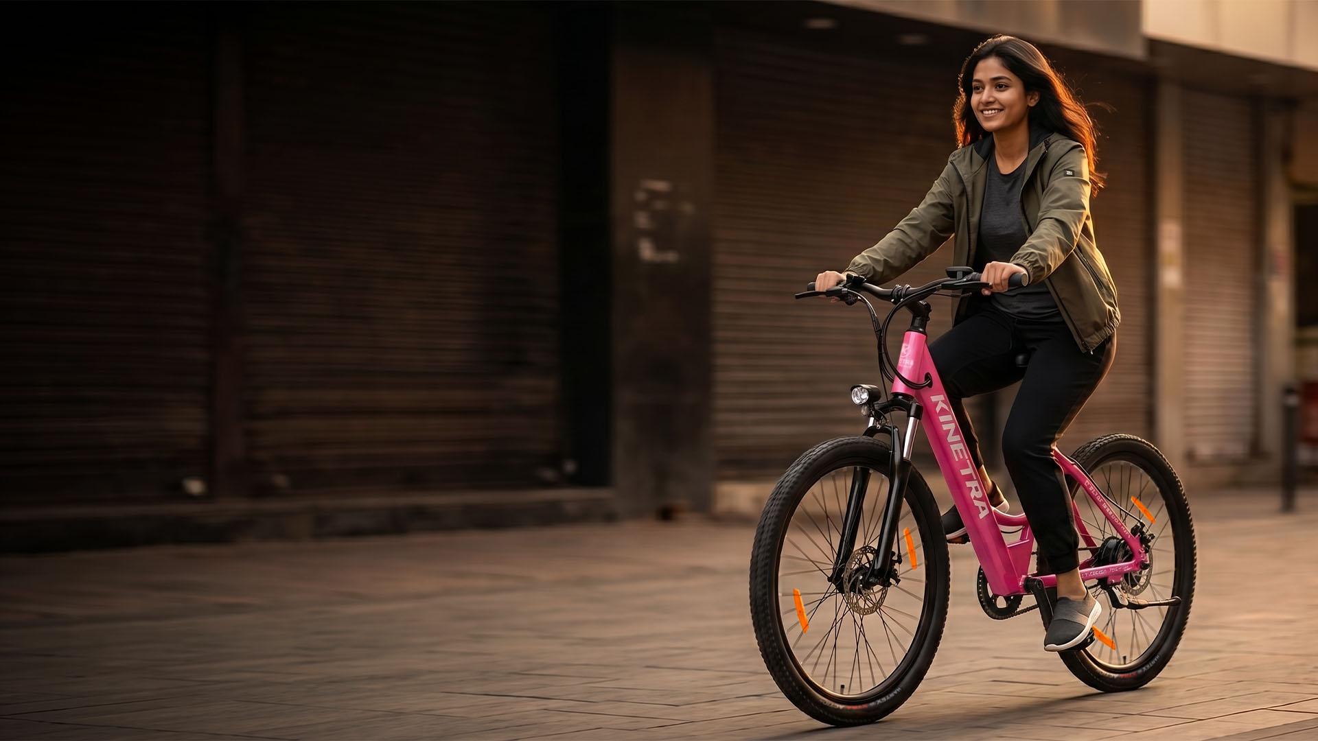 Rider on a Kinetra electric bike in the city